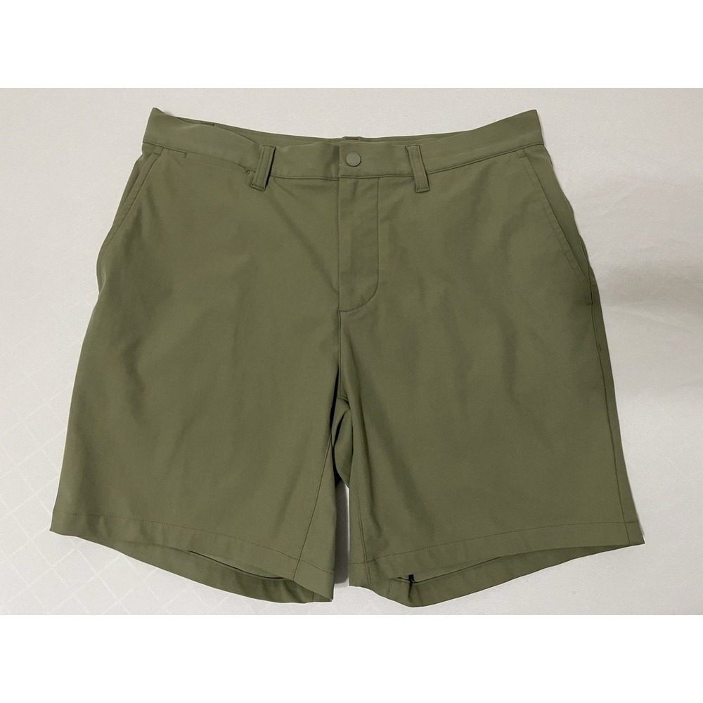 LACOSTE MENS SLIM FIT COMMUTER SHORTS STRETCH 32 POLYESTER KHAKI GREEN 7"